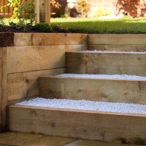 Brown Railway Sleepers | 2.4M x 120mm x 240mm | Our treated Brown Railway sleepers are machined from natural timber therefore creating a great garden aesthetic.